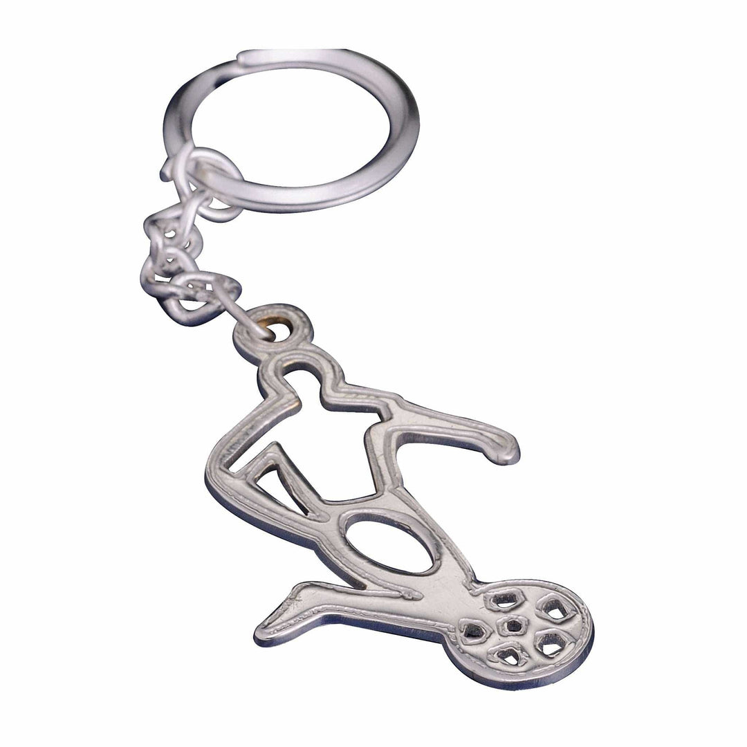 Key Chain Football is a silver key chain forming the silhouette of a footballer caught mid-kick - white background