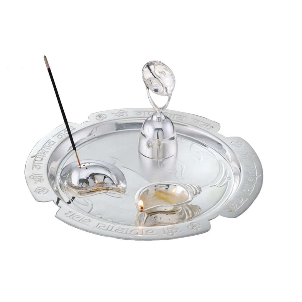 Pooja Thali Sumukh Set engraves the Ganesha mantra around the scalloped border of a silver tray, paired with a conch-shaped diya - white background