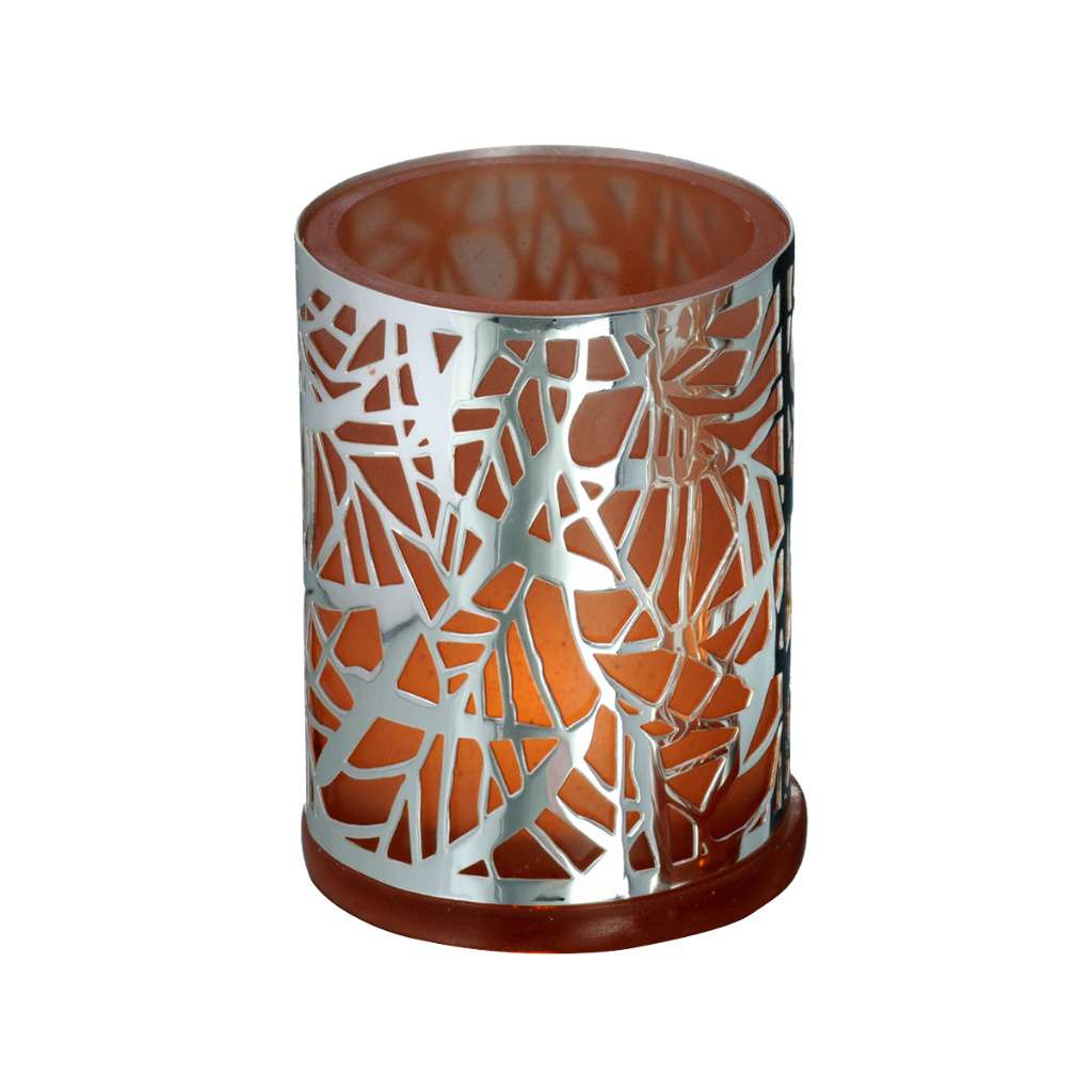 Tea Light Holder Trance is a silver tea light holder that wraps a cracked-glass mosaic pattern of shards around an amber glass lining that glows warm once lit – Small