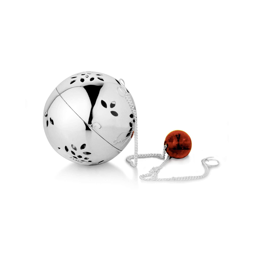 Tea Light Holder Sway takes the form of a spherical silver tealight holder, pierced all over with a fine - white background