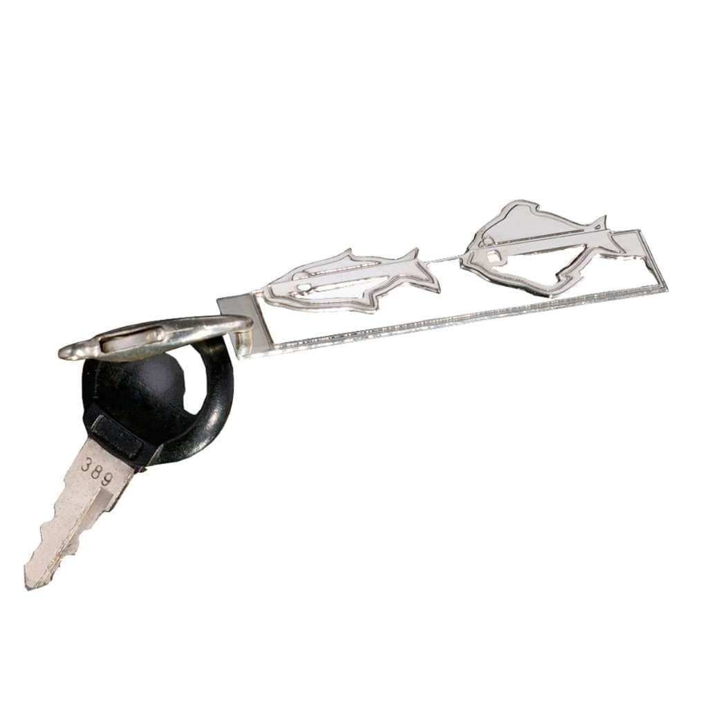 Key Chain Fish is a silver key chain with two fish swimming nose to tail along a slim bar, their outlines cut clean against the open metal - white background