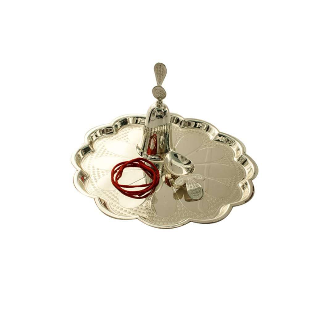 Pooja Thali Radiance is a silver pooja thali opening into a flower shape for its silhouette - white background