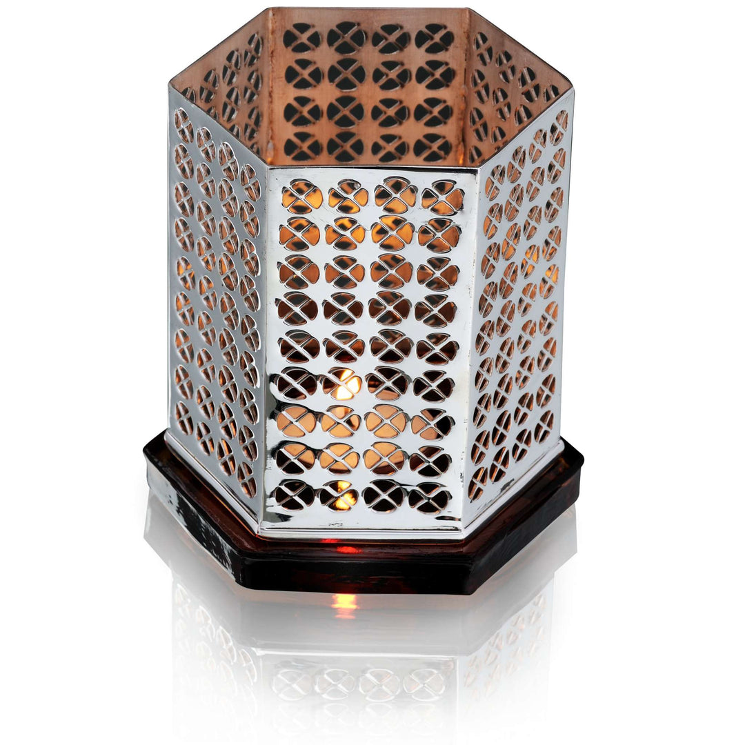 Tealights Holder Aura Hexagonal shapes into a tall, six-sided silver tealight holder - white background