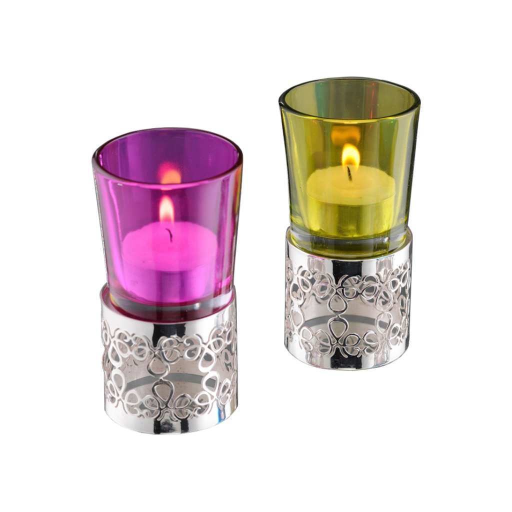 Tealights Holder Twirl cuts a delicate loop-and-swirl pattern into the cylindrical base of this silver tealight holder - white background