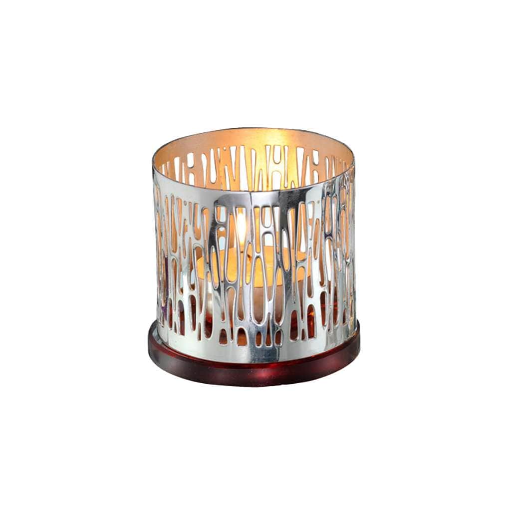 Tealights Holder Caramel flows an organic, drip-like cut pattern down the cylindrical body of this silver tealight holder - white background