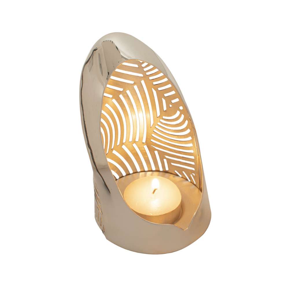Tea Lite Array rises as a tall, shell-like silver tealight holder, its interior cut with a fanned - white background