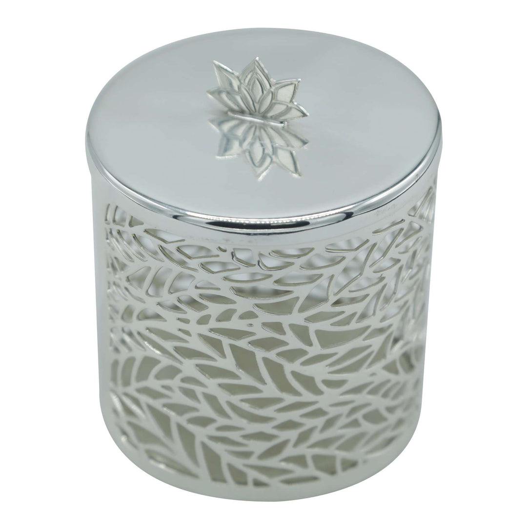 Candle Jar Laurel is a cylindrical silver candle jar wrapped in a laser-cut leaf pattern inspired - white background