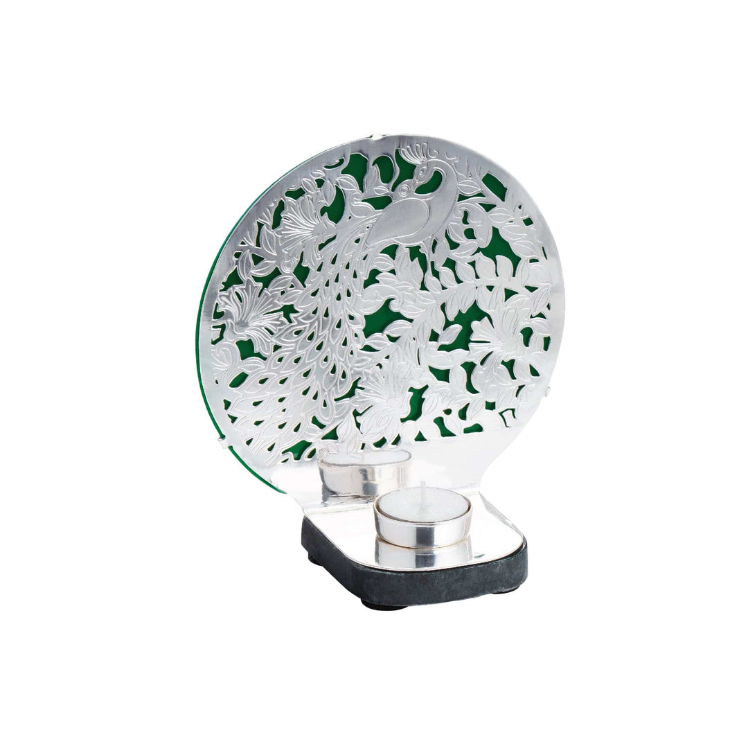 Votive Peacock cuts a dense peacock and floral filigree pattern, backed by a rich emerald-green panel - white background
