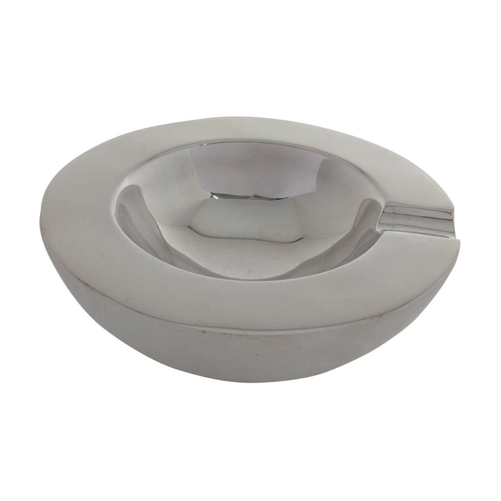 Ashtray Round is a round silver ashtray with a shallow bowl and a cigarette rest notch cut cleanly into - white background