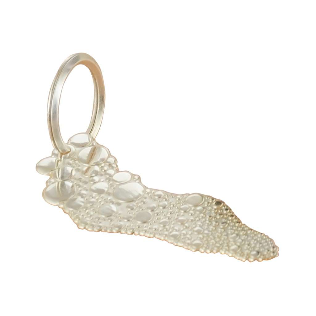 Key Chain Bubbles covers a teardrop-shaped silver keychain in clusters of raised bubble-like domes, a dense - white background