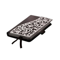 Diary Tree Of Life sets the same dense scrolling vine motif from the Tree of Life collection diagonally across a black leather-bound silver diary - white background