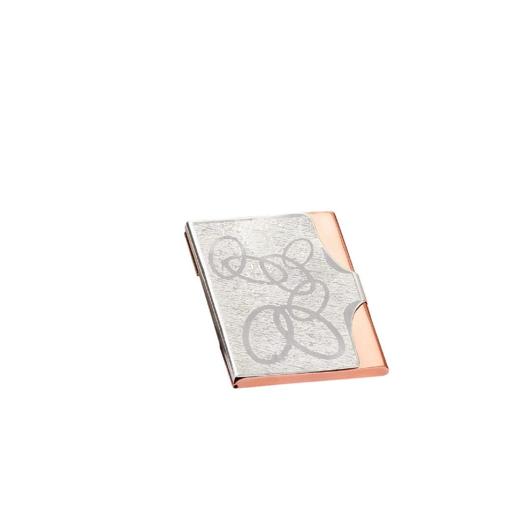 Card Holder Cosmos is a silver card holder with a smooth copper-toned edge running along its spine - white background