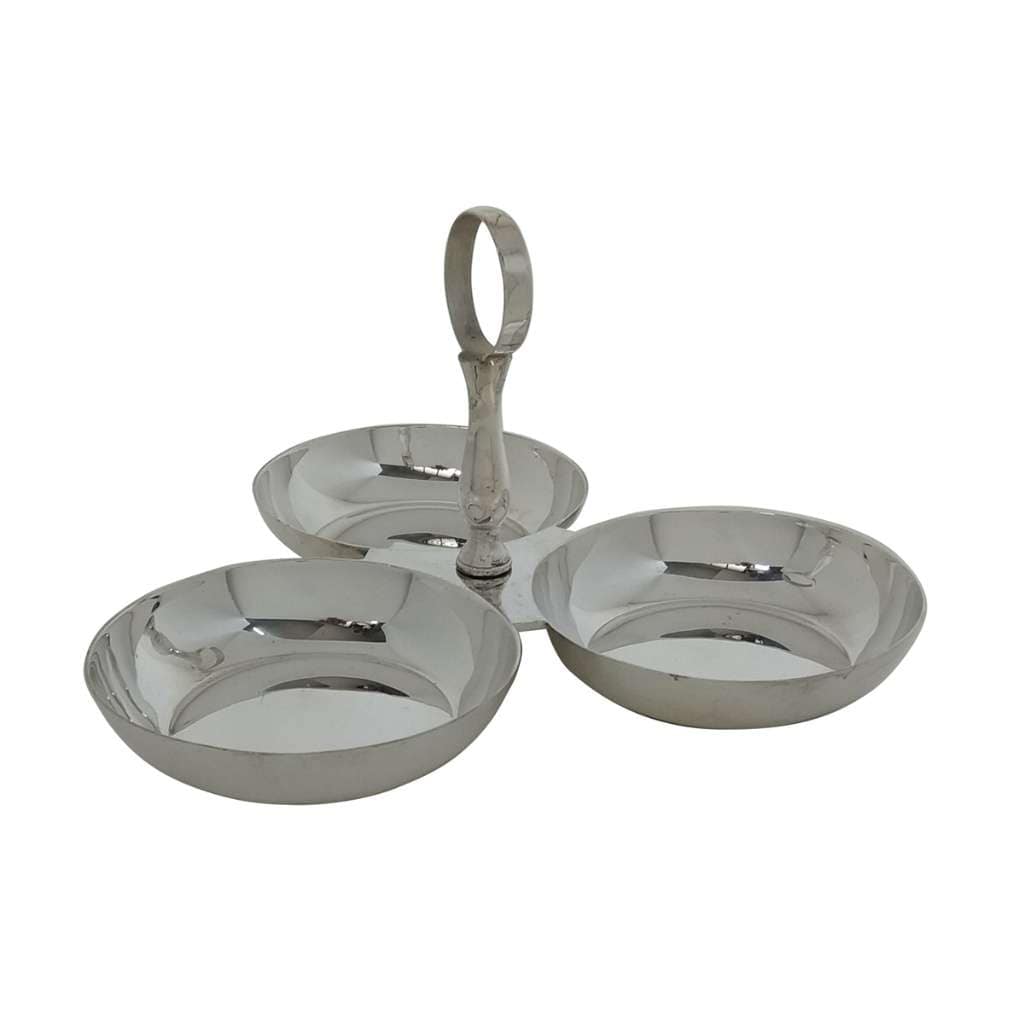 Bowl 3 Together gathers three round silver bowls around a single ring handle, made for serving nuts, dry - white background