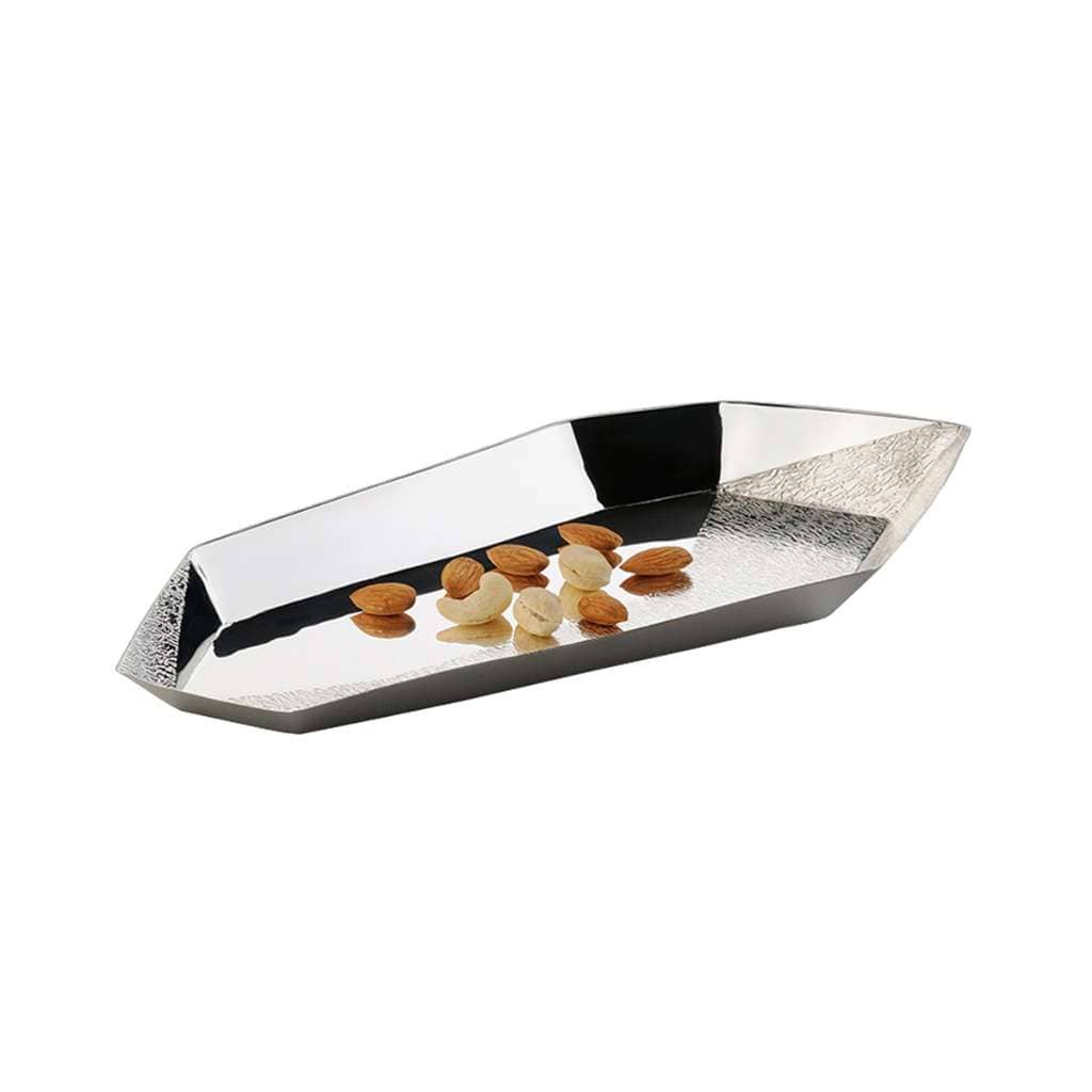 Tray Braque is a faceted, boat-shaped silver tray that pairs a mirror-polished centre with a hammered-texture finish along both pointed ends - white background