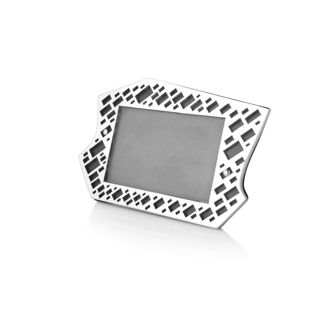 Photo Frame Brick is a silver frame cut into an irregular, angular silhouette - white background