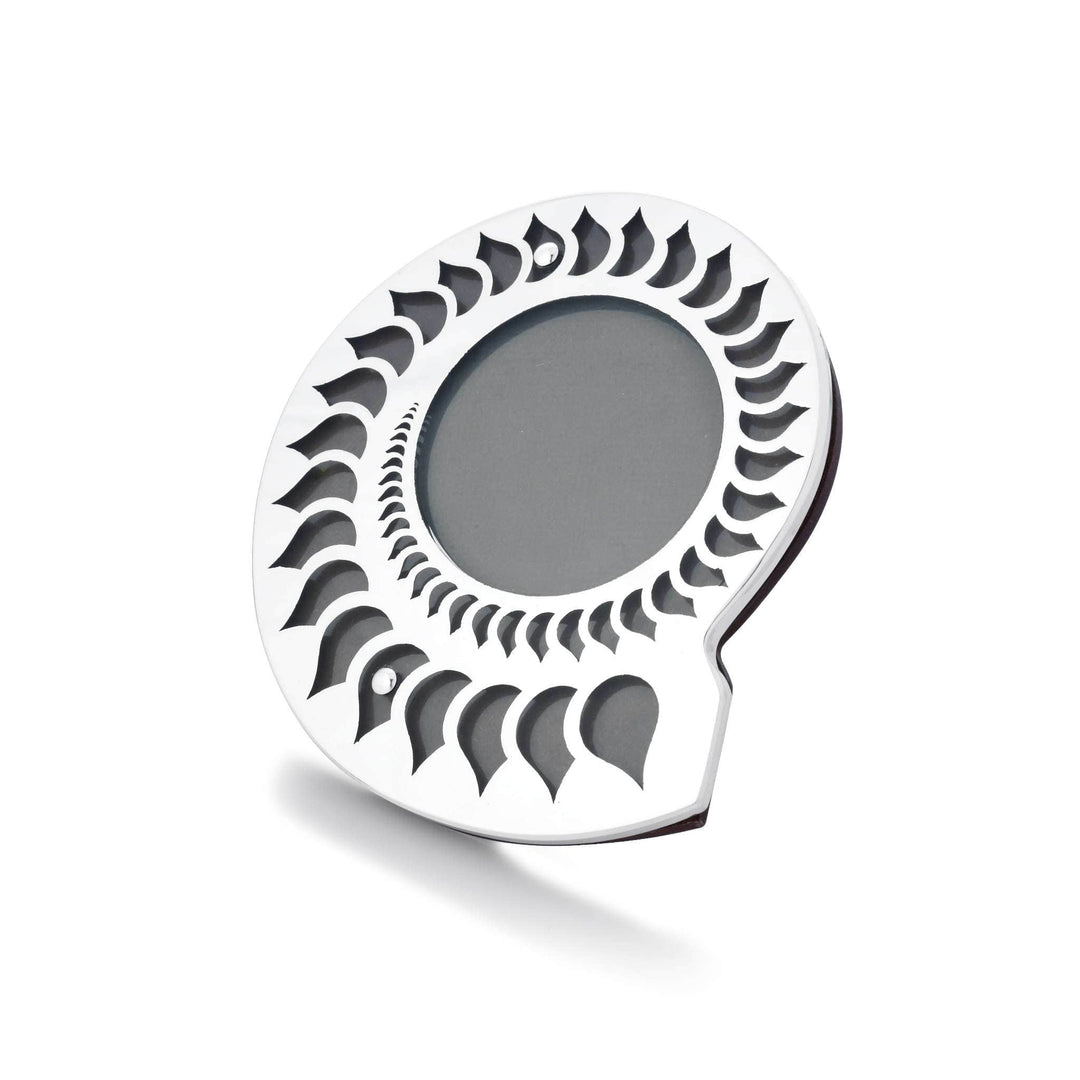 Photo Frame Comma is a silver frame with a comma-shaped silhouette - white background