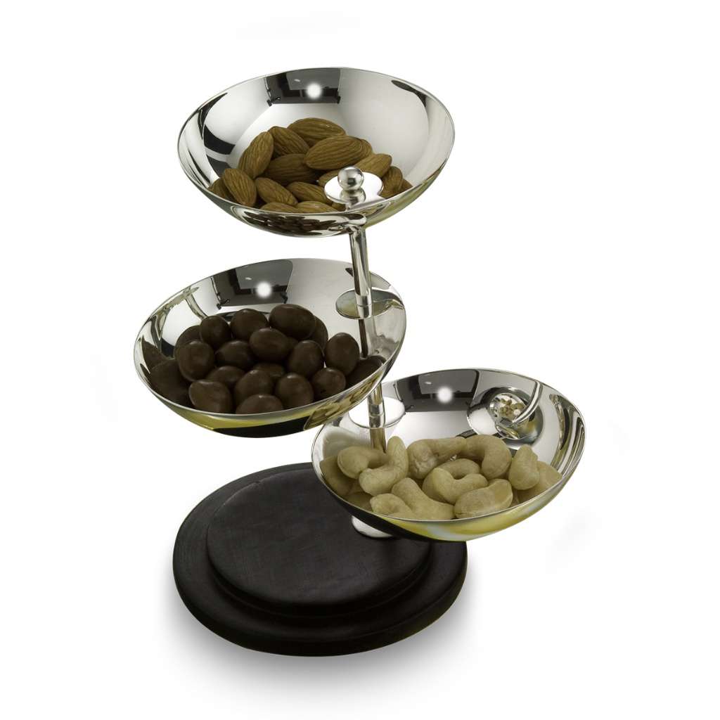 Bowl Swinging Nut Dish stacks three small silver dishes on a single stem over a round wooden base, each - white background