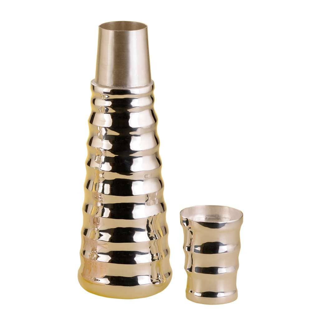 Jug Rippled is a tall, tapering silver jug that rises in a column wrapped in a stack of horizontal - white background