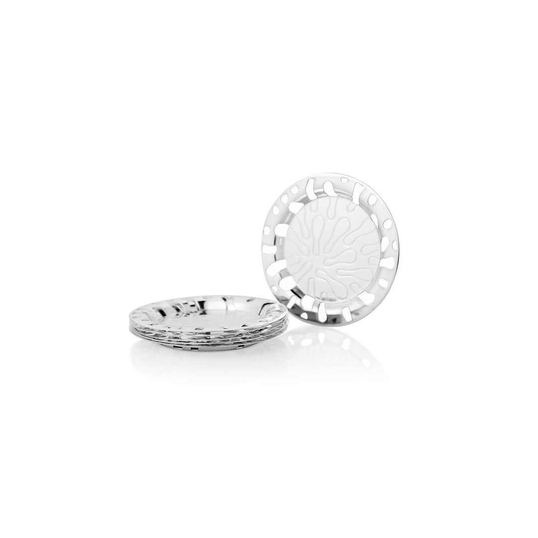 Coaster Zinnia is a silver coaster cut in an open floral pattern, its petal-like openwork ringing a smooth swirl-textured centre - white background