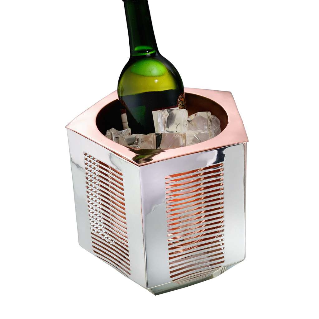 Wine Cooler Chasm is a hexagonal silver wine cooler with a double-walled build, its sides pierced with fine vertical slits - white background