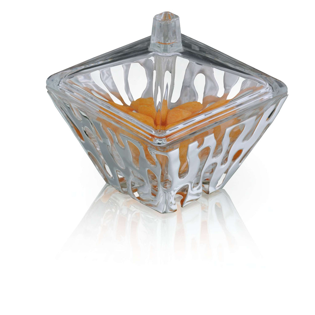 Bowl Square Graffiti With Lid runs a lattice of cut-out drips up the sides and lid of this square silver bowl - white background