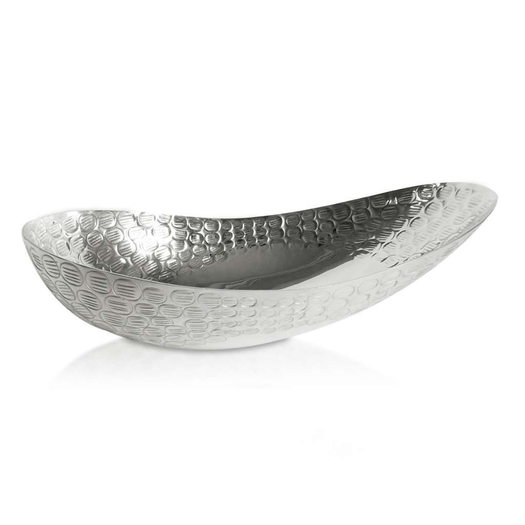 Bowl Fossil covers the exterior of this elongated, boat-shaped silver bowl in a honeycomb-style textured pattern resembling fossil imprints - white background