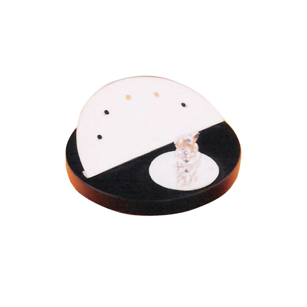 Incense Holder Slant is a sterling silver incense holder that pairs a slanted half-moon plate for sticks with a full-moon disc for cones - white background