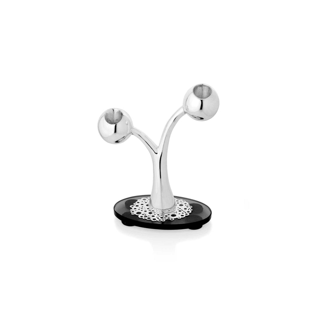 Candle Stand Diffusion is a sterling silver candle stand that grows upward like a tree, its stem splitting into two, three – 2 Lite
