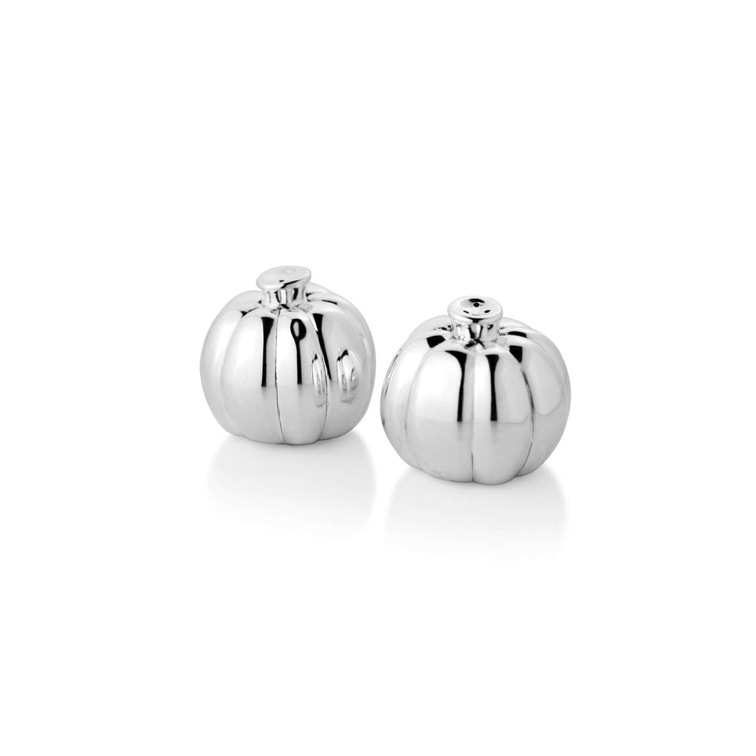 Salt And Pepper Pumpkin forms a pair of ribbed pumpkins for this sterling silver salt and pepper set, each fitted with a stopper at the stem - white background