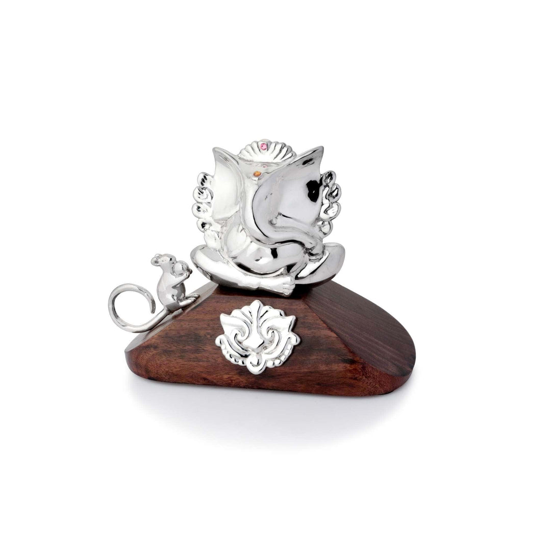 Ganesh Ten Armed sits a sterling silver Ganesha bust beneath a gold-toned umbrella canopy raised on a slim brass rod – Small
