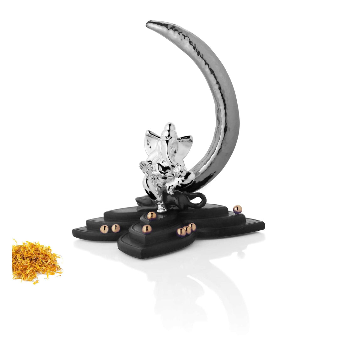 Ganesh Moon cradles a sterling silver Ganesha idol in the curve of a large hammered-texture crescent moon - white background