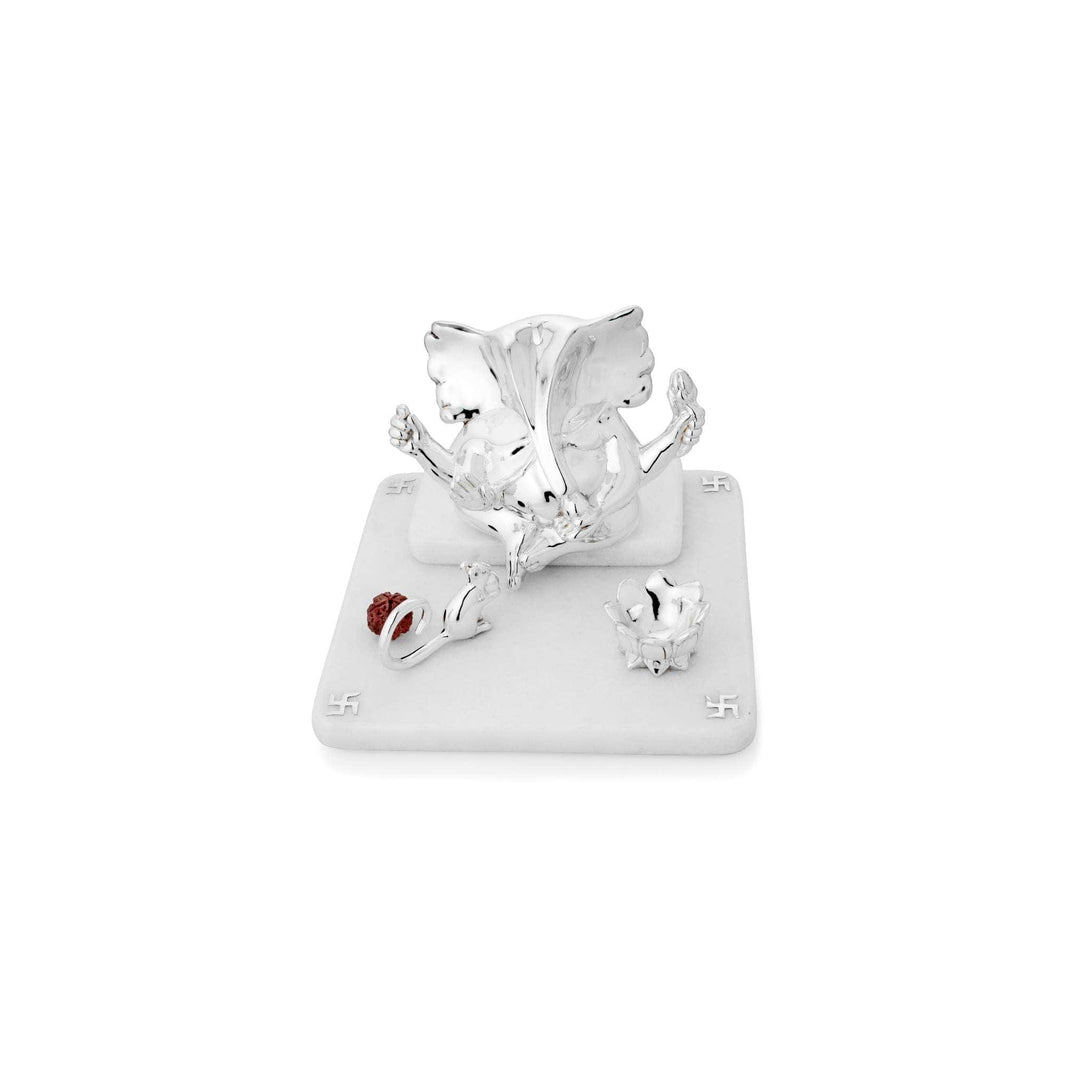 Mandir Vigneshwara is a sterling silver Ganesha idol rendered as an abstract sculptural form - white background