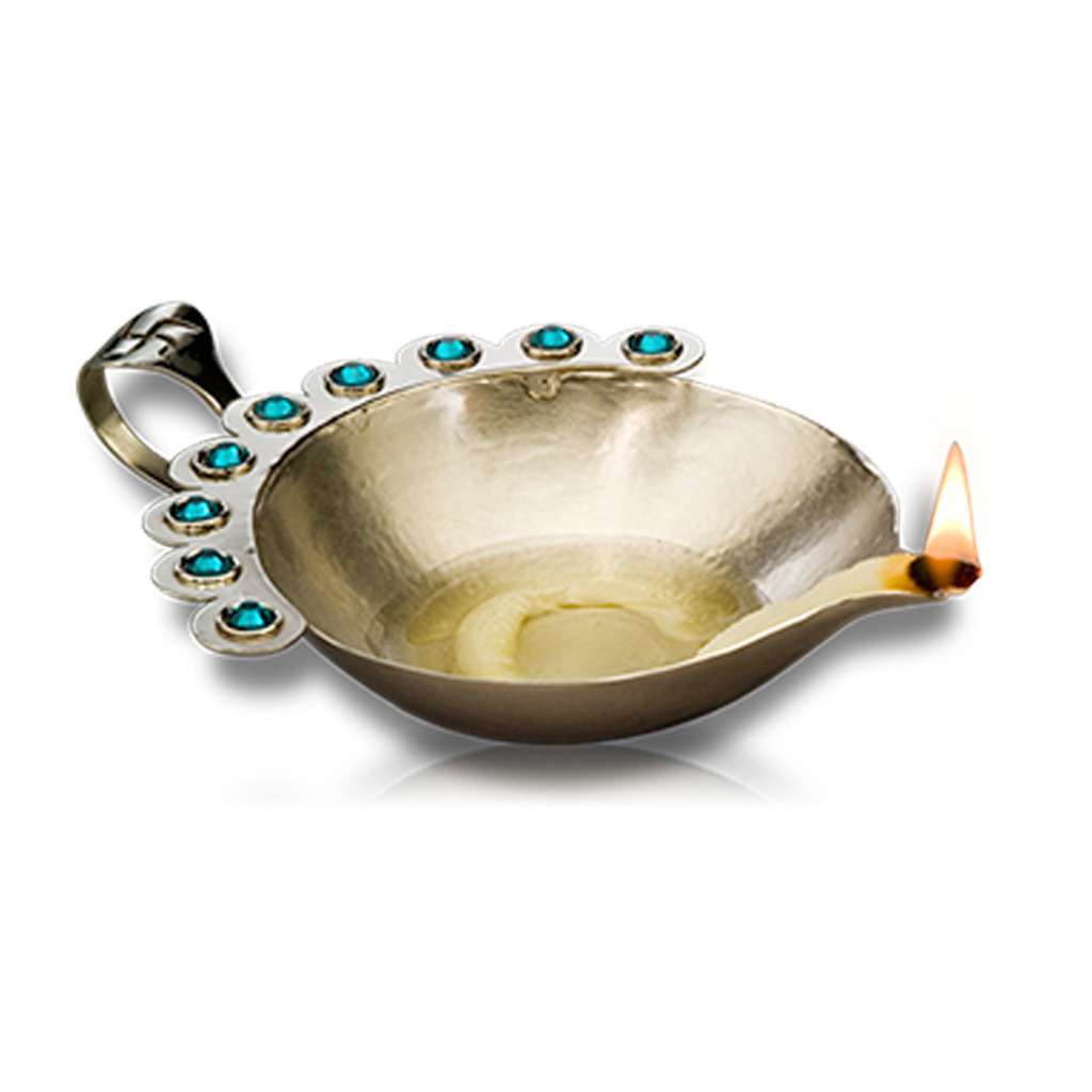 Diya Jyoth takes its shape from the peacock, a bird tied to Krishna and to Lakshmi in Hindu tradition - white background