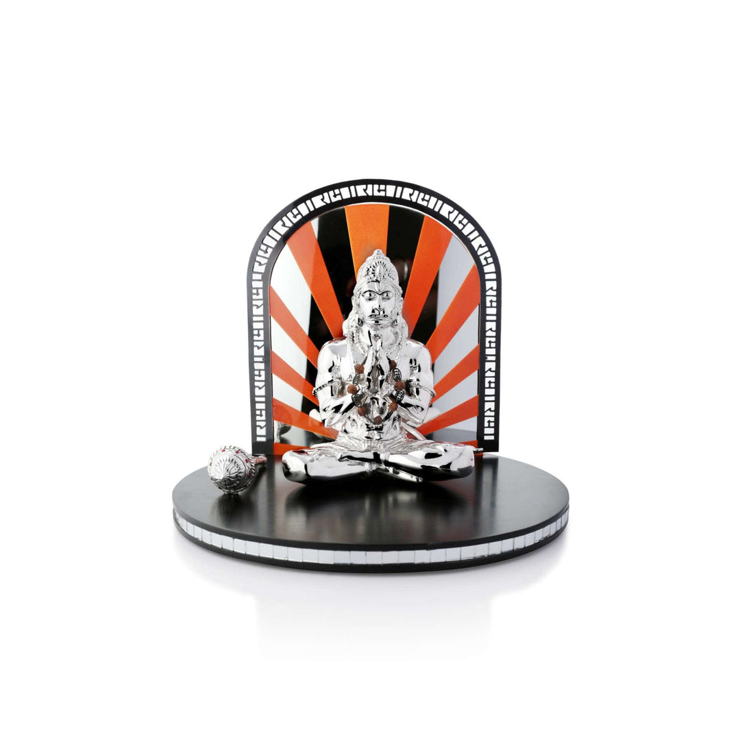 Hanuman Prayerful is a large sterling silver Hanuman idol seated with palms folded in prayer - white background