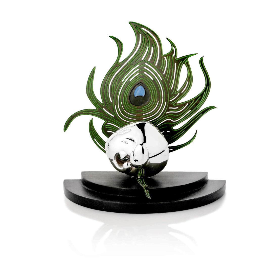Ganesh Mayuresh shows Ganesha in profile, a smooth sterling silver head set against a hand-painted peacock feather - white background