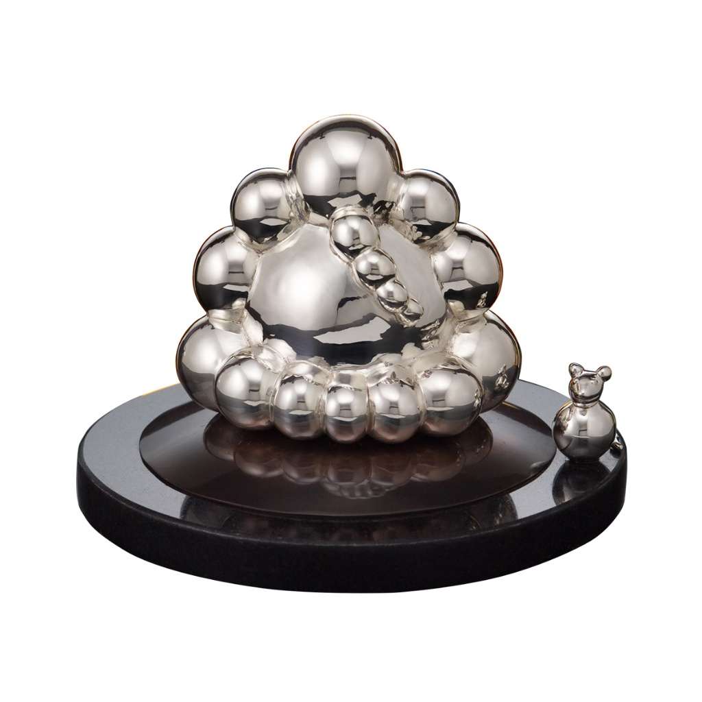 Ganesh Laddoo builds a sterling silver Ganesha idol from a cluster of rounded spheres, echoing the shape of a laddoo - white background
