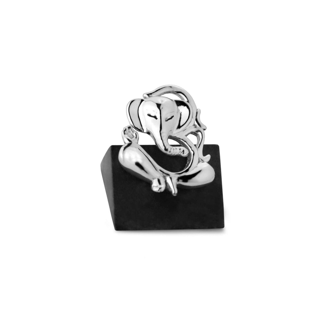 Ganesh Om reimagines the sterling silver Ganesha idol as a single flowing silhouette - white background