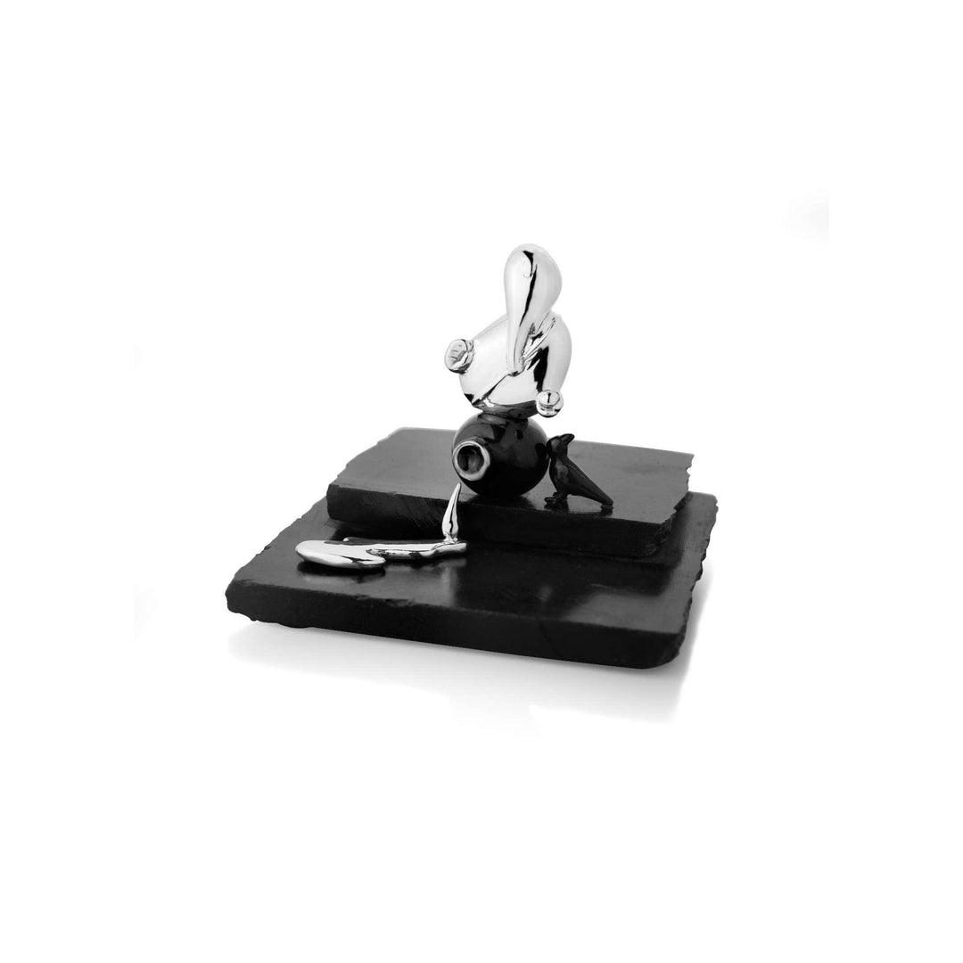 Ganesh Kaveri is a sterling silver sculpture that reimagines Ganesha as an abstract water carrier - white background