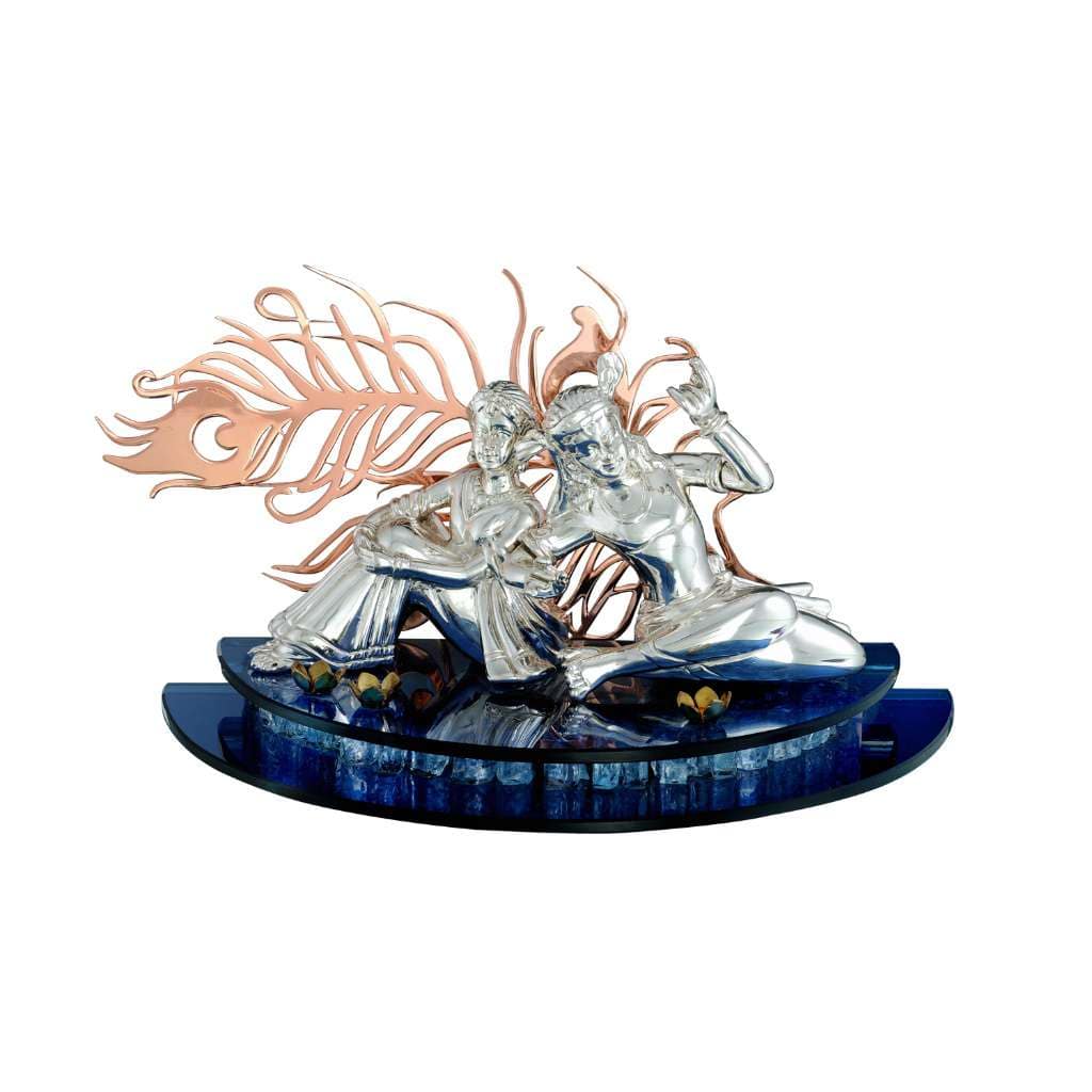 Radha Krishna Relaxing is a sterling silver idol showing Radha leaning back against Krishna as he rests - white background