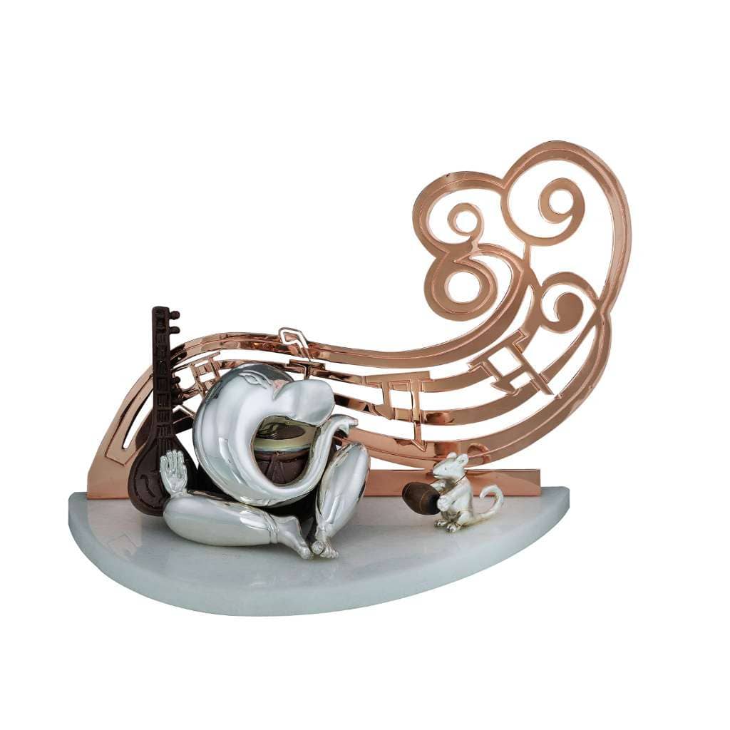 Ganesh Music Lover seats a sterling silver Ganesha idol cross-legged with a stringed instrument styled like a veena resting against one arm - white background