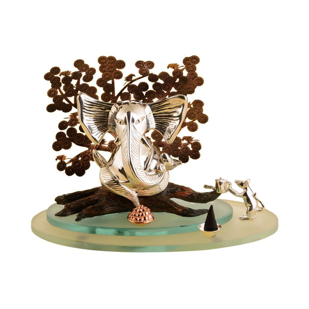 Ganesh Prosperity brings together a detailed sterling silver Ganesha bust, a copper-toned blossoming tree - white background