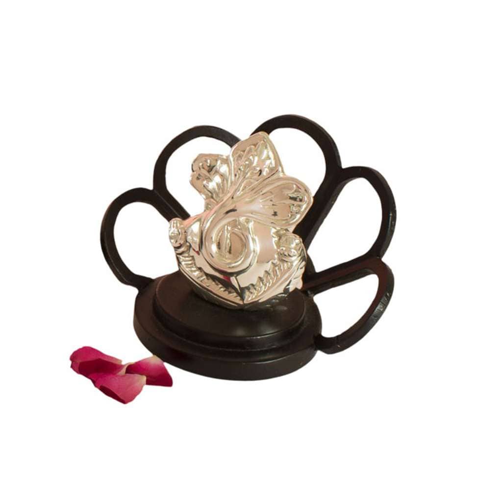 Ganesh Hibiscus turns a silver Ganesha face into the centre of a hibiscus bloom, silver petals framing - white background