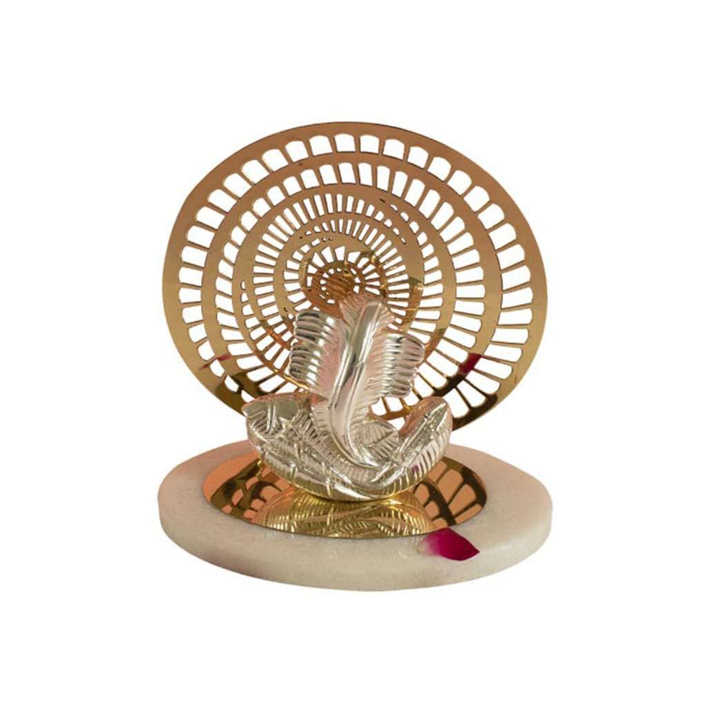 Ganesh Ambusara is a sterling silver Ganesha idol rendering Ganesha in Ambusara form, an abstract, stylised take on the trunk and ears - white background