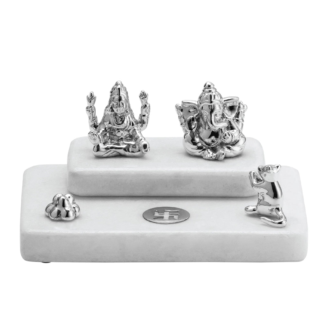 Laxmi Ganesh on Dual Stone is a sterling silver idol set sitting Lakshmi and Ganesha side by side on lotus pedestals – Small