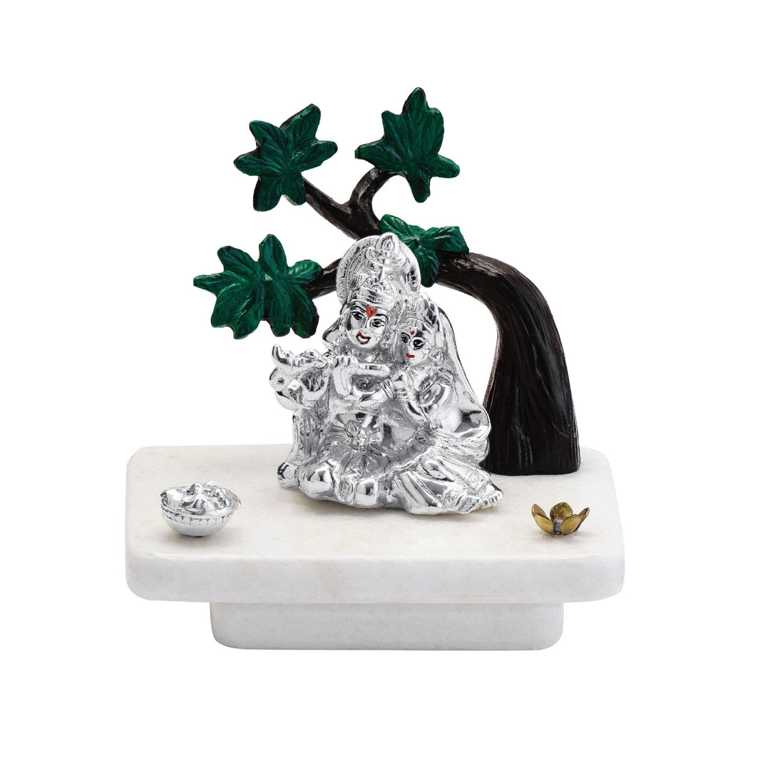 Radha Krishna Tree sets a sterling silver idol of Radha Krishna beneath a hand-painted bonsai tree - white background