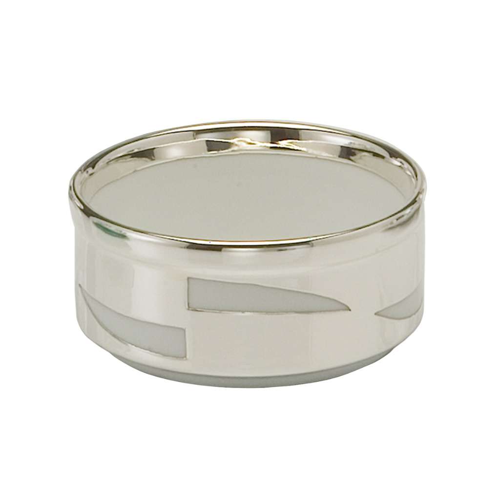 Bowl Porcelain is a sterling silver bowl built around a fine white porcelain body - white background