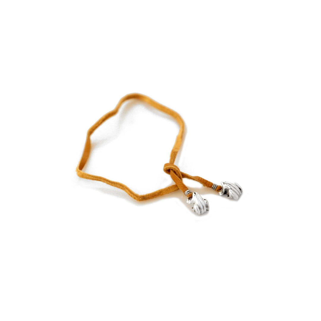 Bookmark Frog sits a small frog charm at each end of this sterling silver bookmark&