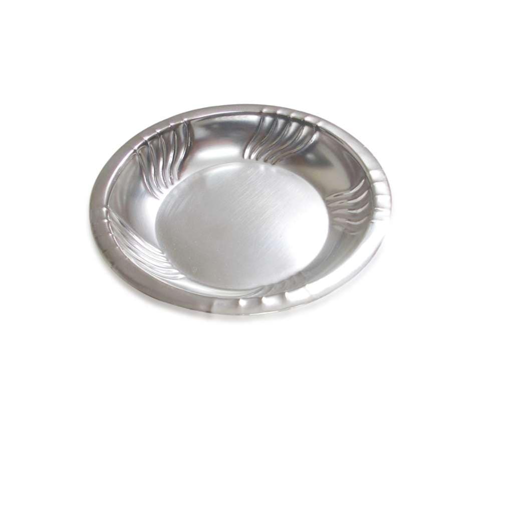 Wave Bowl Halwa is a silver dish with a wave motif pressed into the rim in radiating flame-like lines around a brushed centre - white background