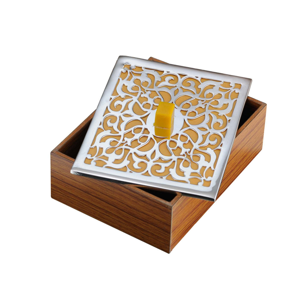 Box Amaltaas is a silver box pairing a rosewood-toned wood base with a laser-cut lid, its floral jaali pattern set over a warm amber panel – Small