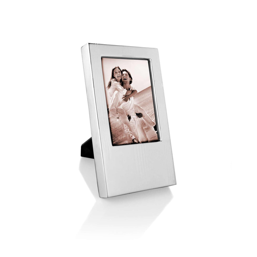 Photo Frame Hairline cuts fine hairline grooves into one corner of this silver frame&